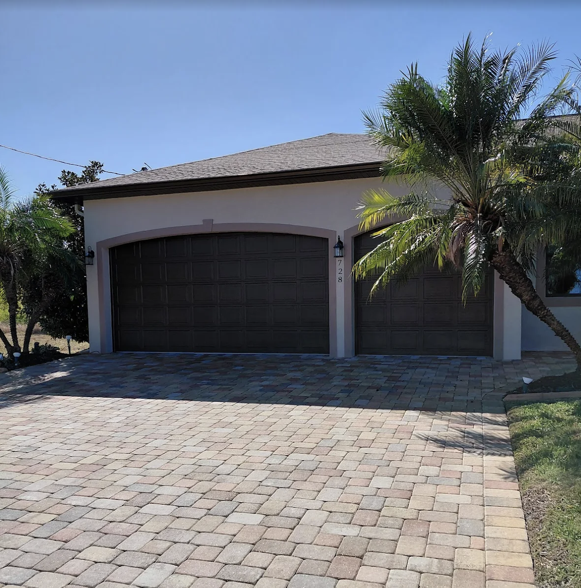 Completed exterior repaint on a Bonita Springs home by Apex Painting Group