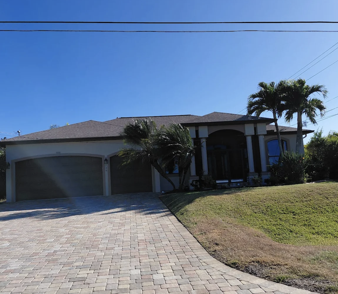 Luxury home exterior repaint by Apex Painting Group in Bonita Springs Florida