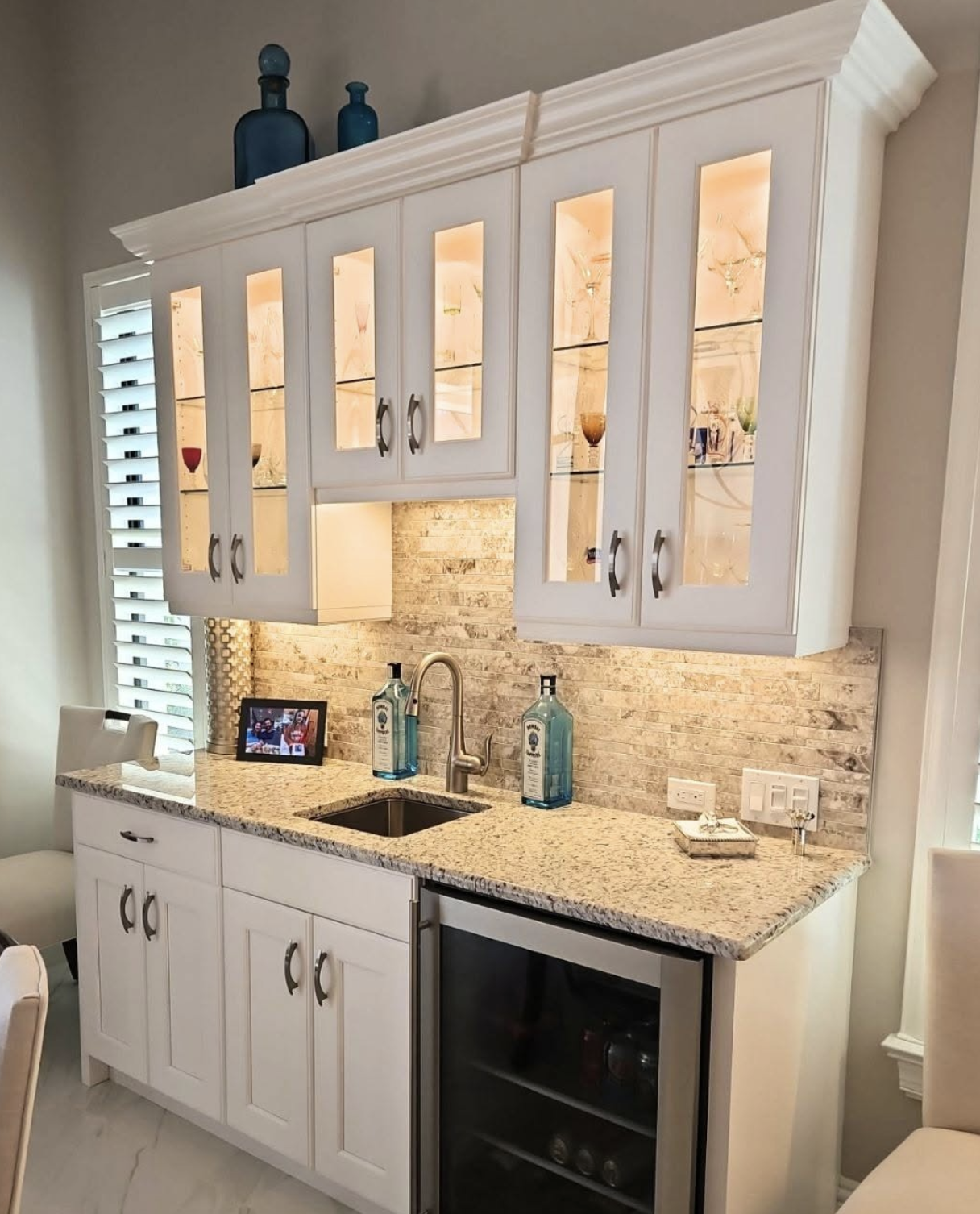 Pure White kitchen cabinet painting completed by Apex Painting Group in Miromar Lakes