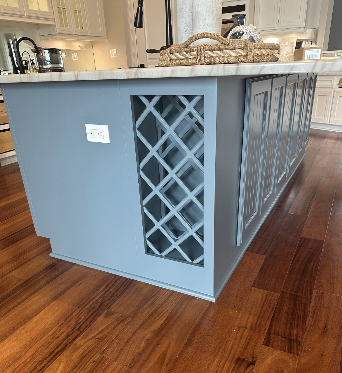 Two-tone kitchen cabinet painting completed by Apex Painting Group in Verandah, Fort Myers