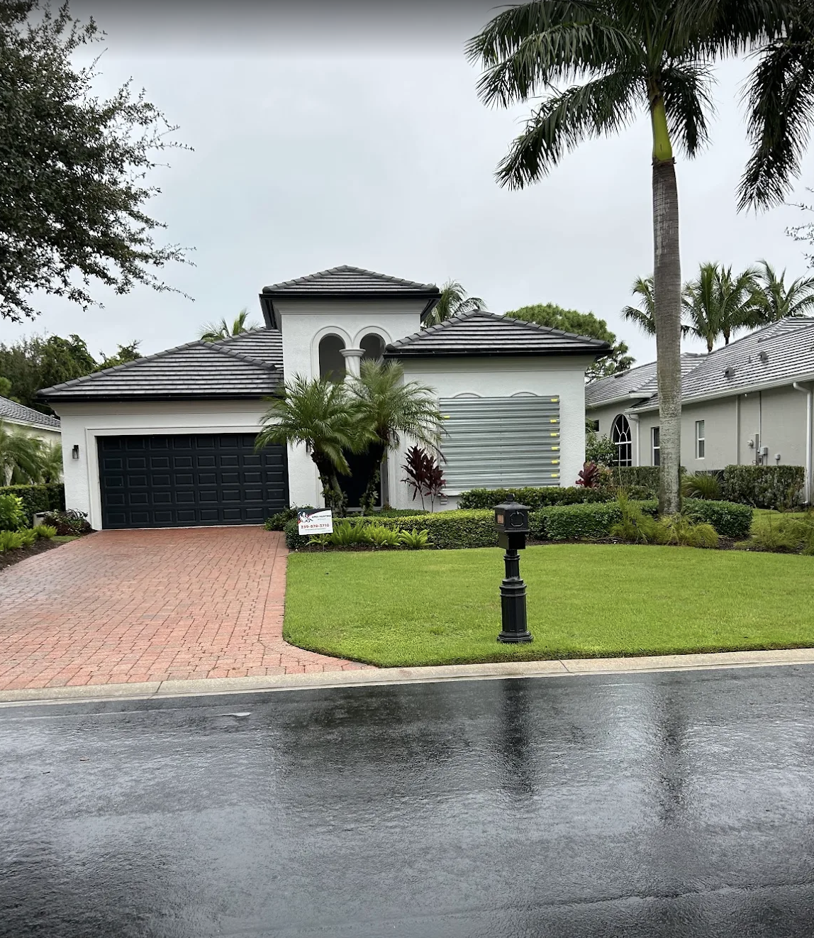 Completed full exterior painting project by Apex Painting Group in Estero Florida