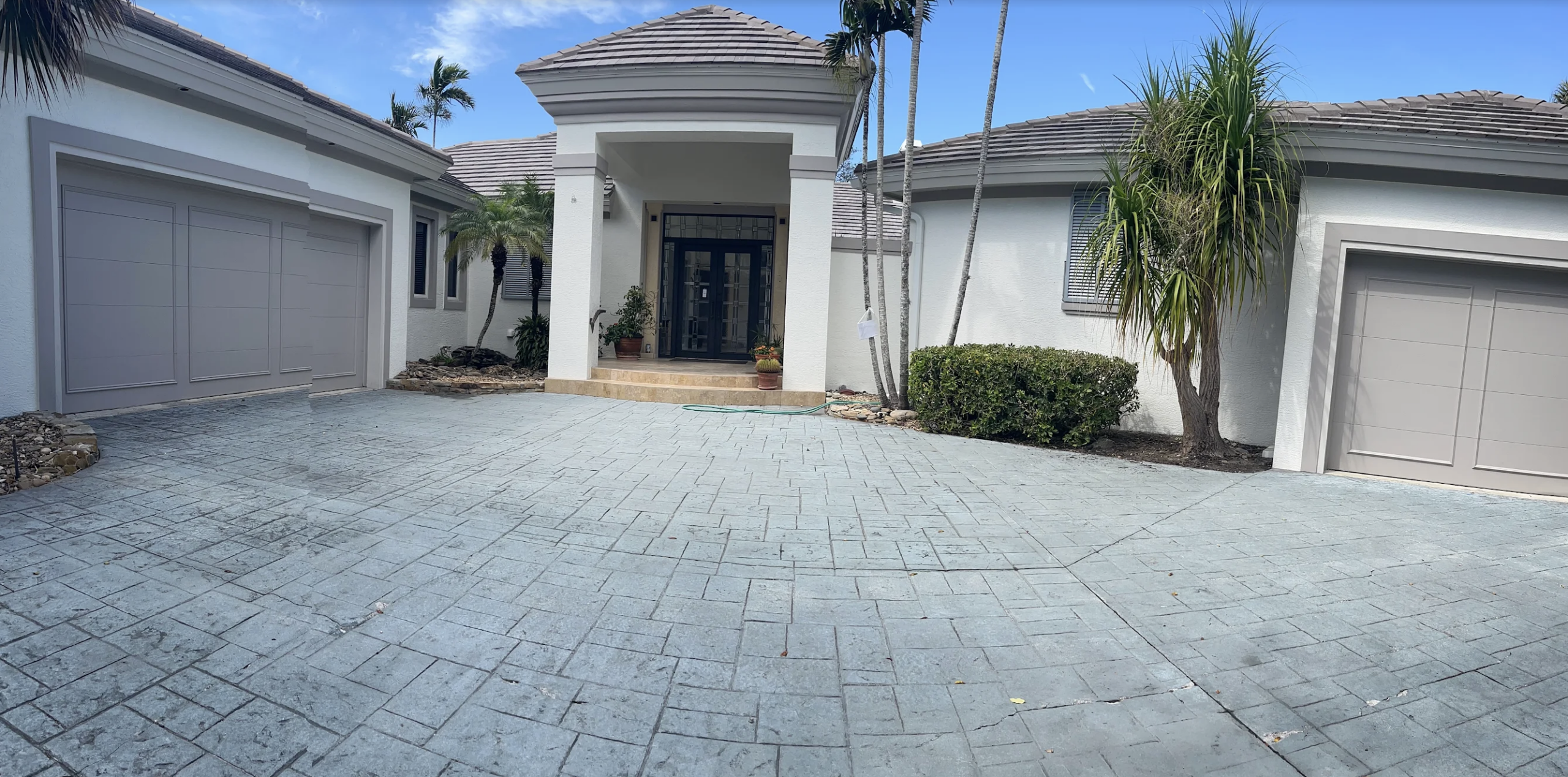 Poolside exterior after painting at a Creekside at Bonita Bay home