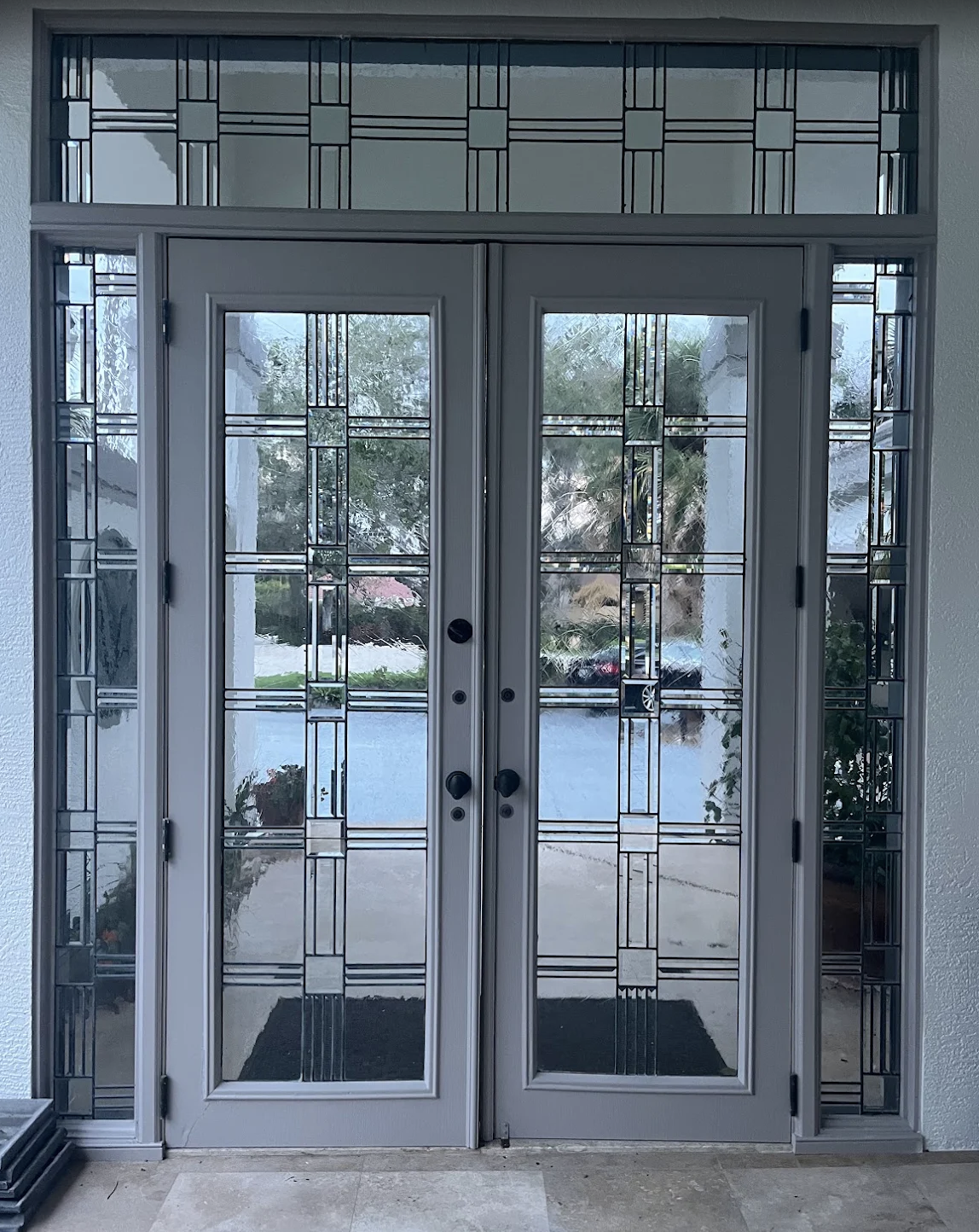 Painted entry doors at a Creekside at Bonita Bay exterior painting project