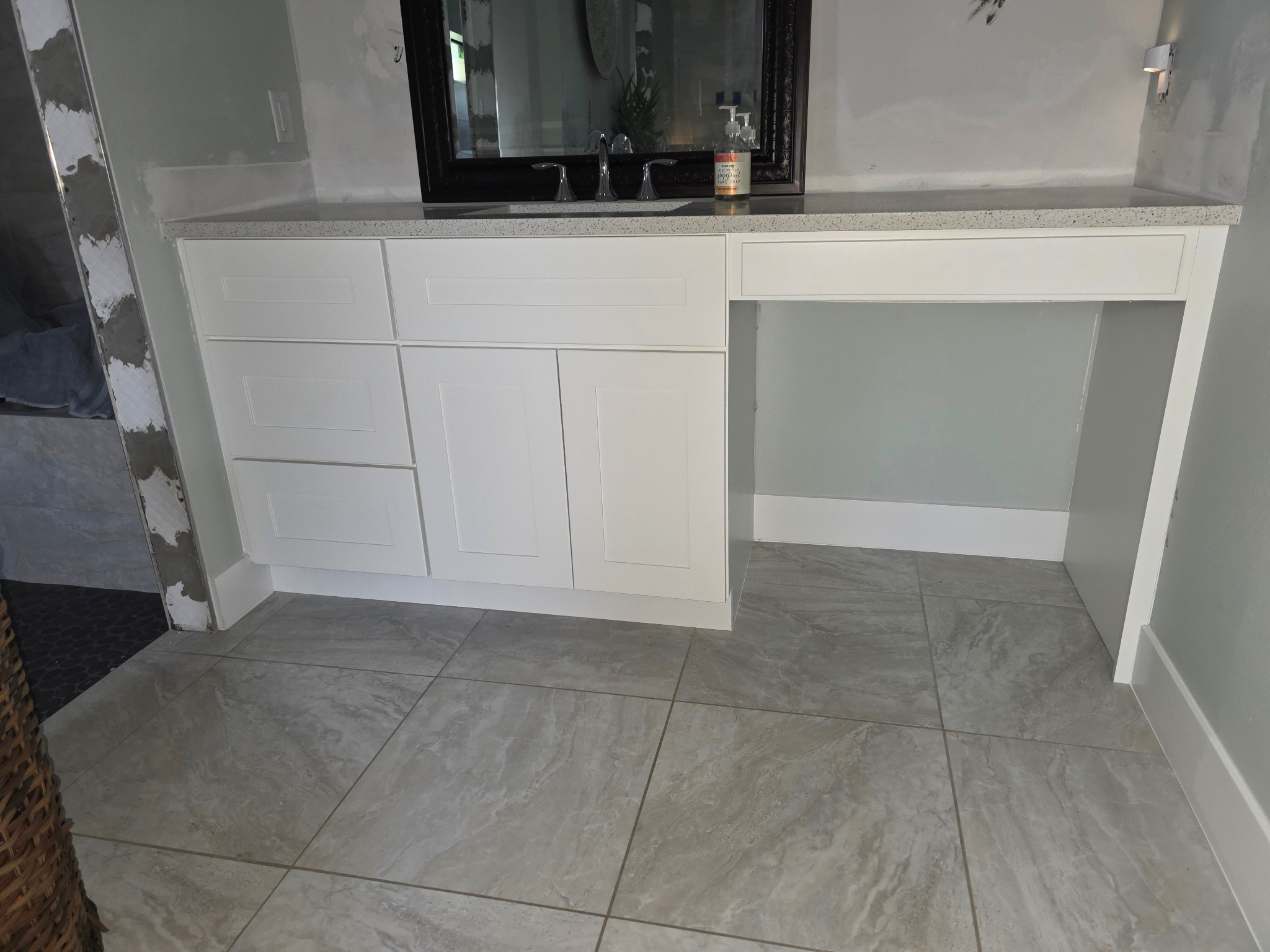 Bathroom vanity and makeup area painted Sherwin-Williams Alabaster in Southwest Cape Coral