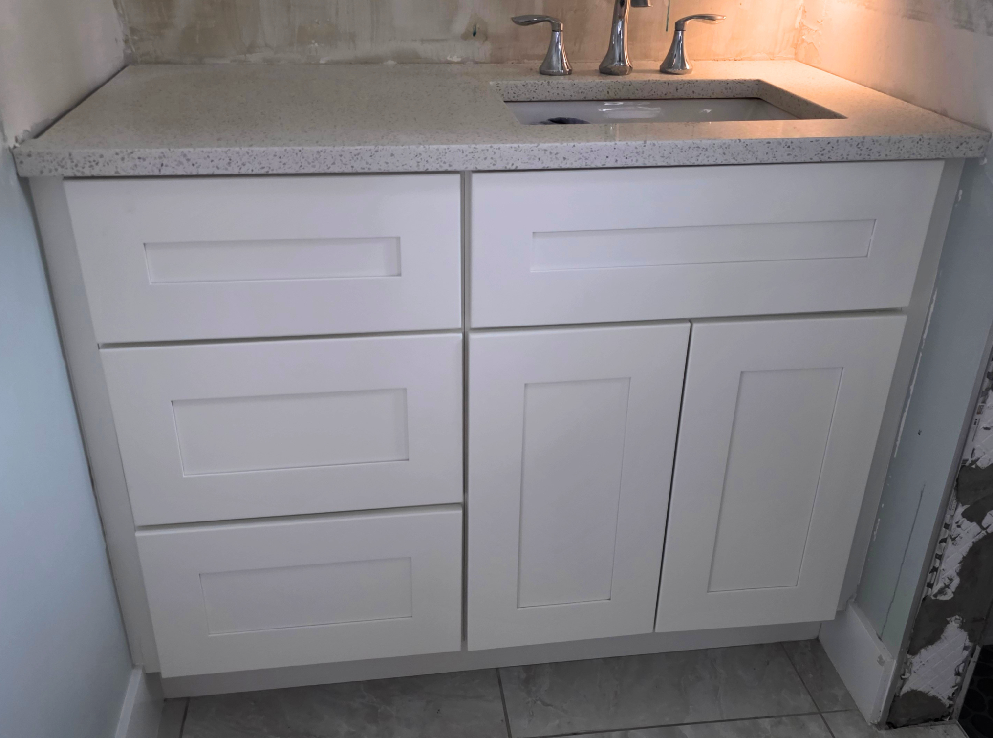 Close-up of bathroom cabinet doors and drawers painted Alabaster in Southwest Cape Coral